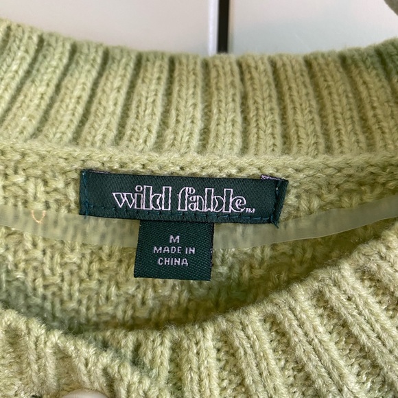 Green sweater. - Picture 2 of 3